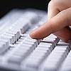 Finger pressing computer key